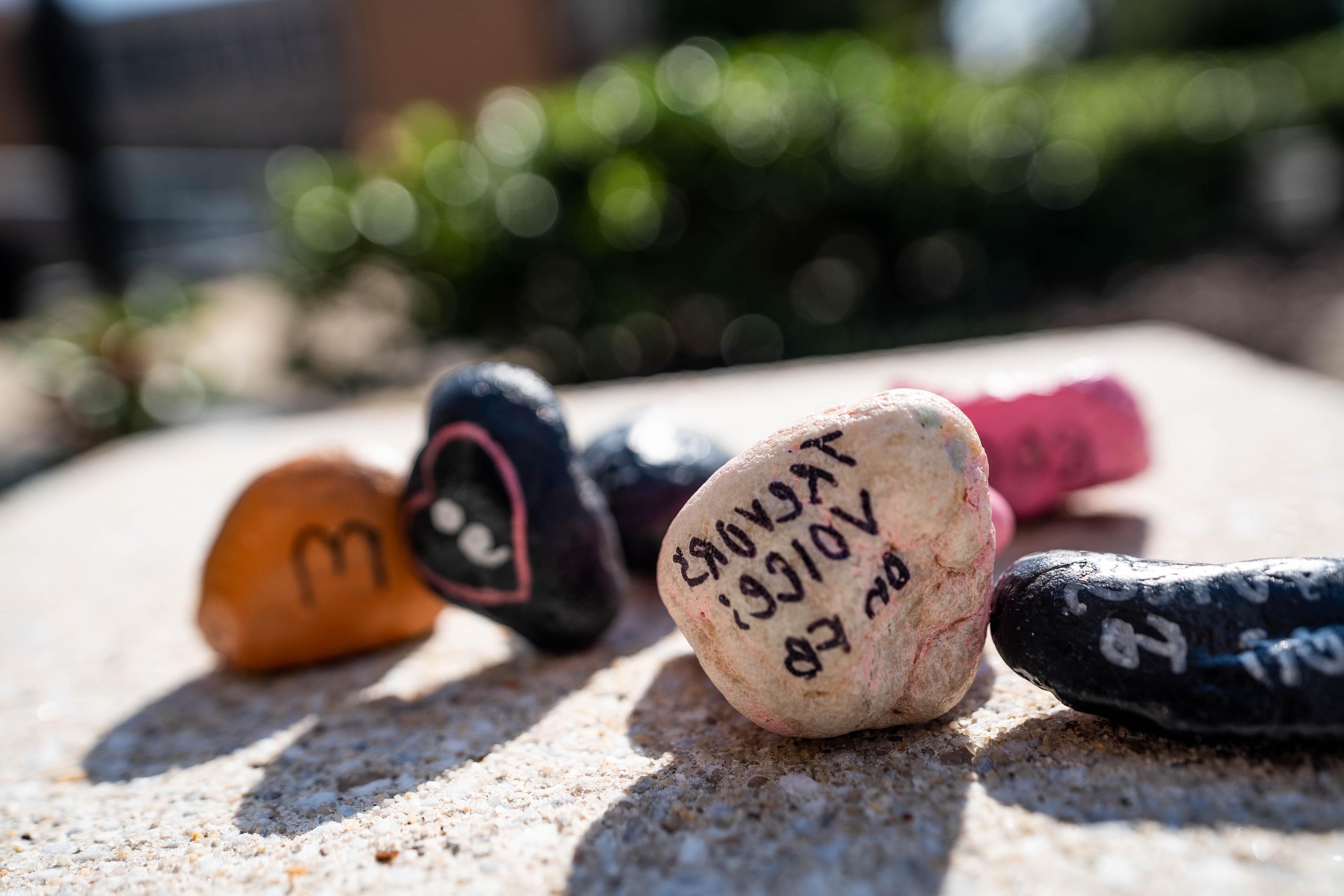 Painted stones with suicide-prevention messages